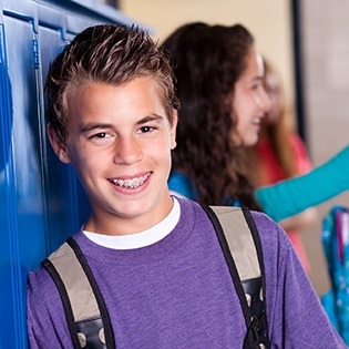 Preteen boy with braces