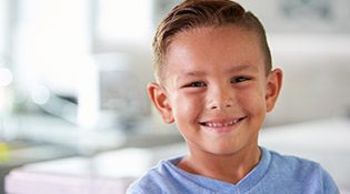 Smiling little boy with healthy teeth