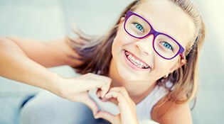 Girl with braces smiling