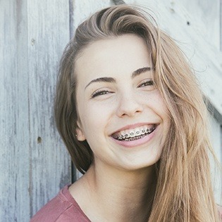 Teen girl with metal braces